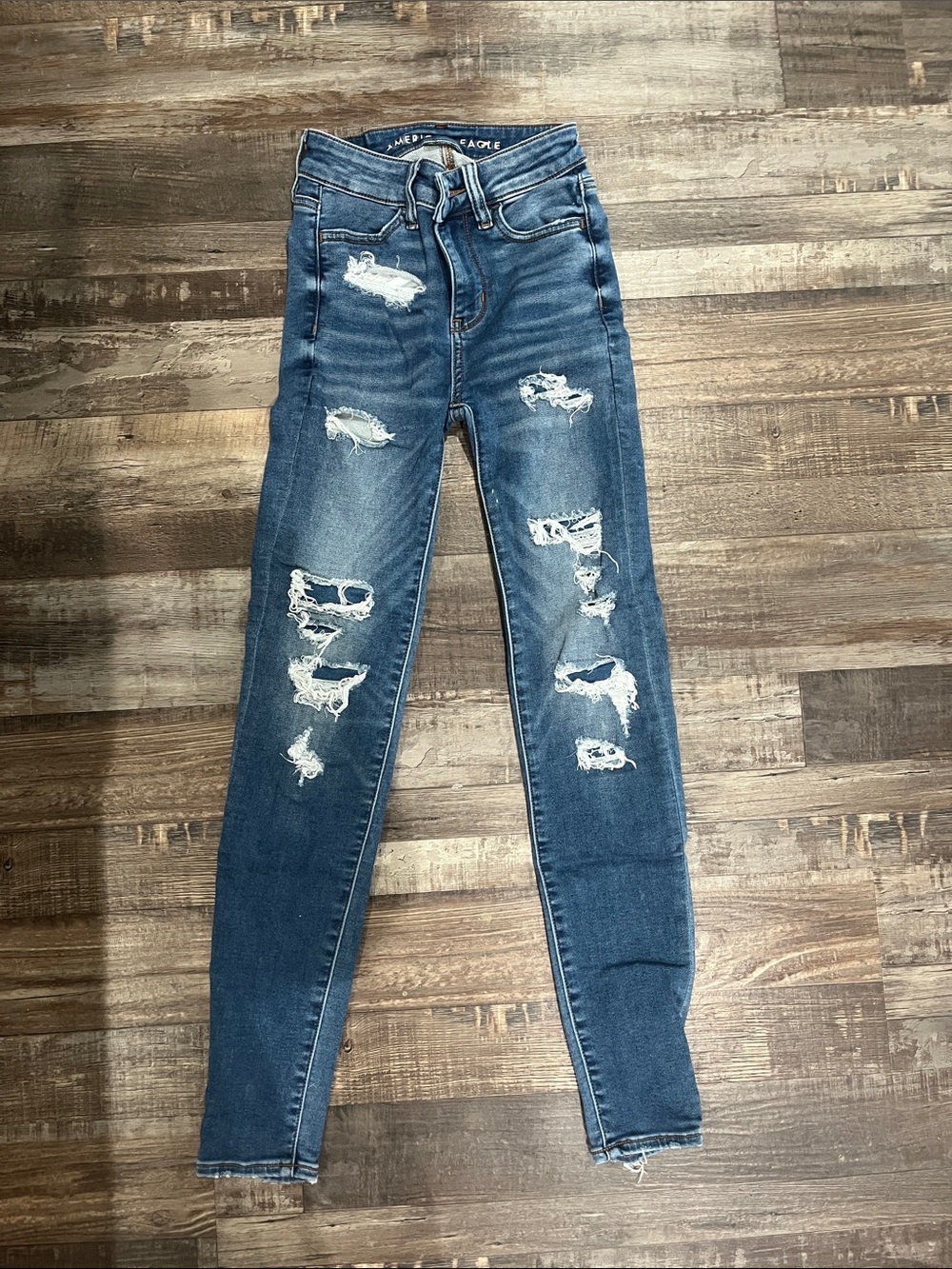 American Eagle Outfitters Ripped High-Rise Skinny Jeans in Blue